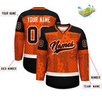 Custom Orange Black White Cashew Flower Graffiti Pattern V-Neck Hockey Jersey